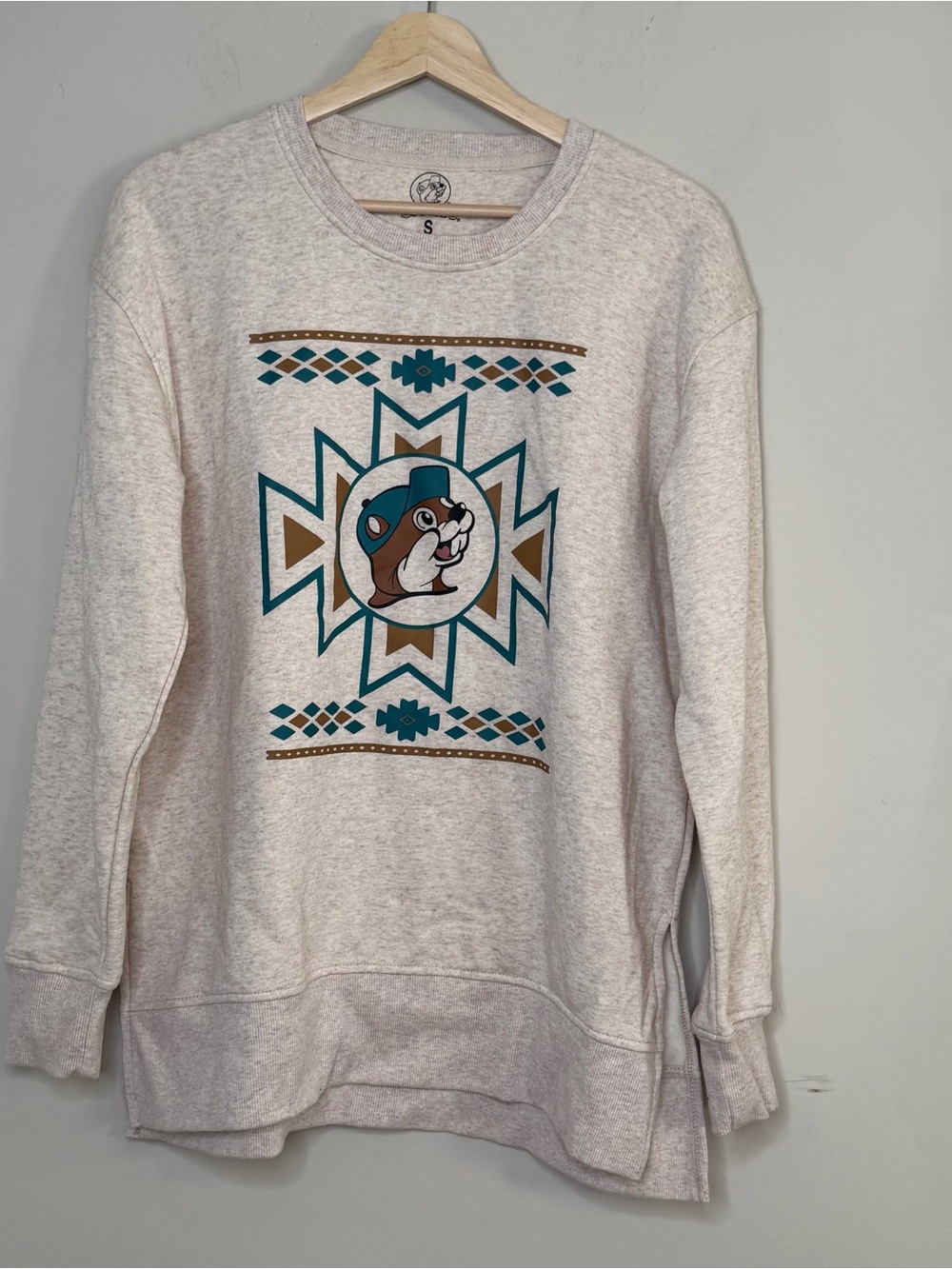 Cream Graphic Pullover Sweatshirt with Teal & Brown Motif